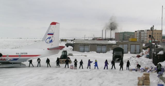 Всем миром.